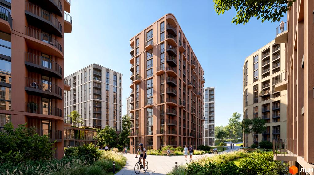 Фасади коричневих та світлих багатоповерхових будинків ЖК Uptown, озеленнена пішохідна алея з людьми та велосипедистом.