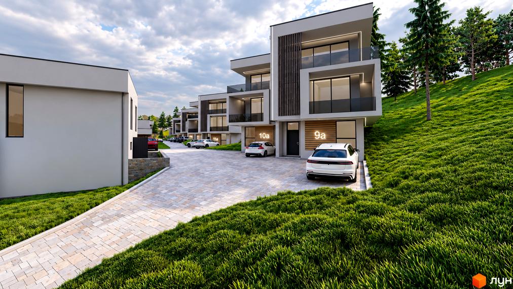 Котеджне містечко Crocus Village: білі триповерхові будинки з панорамними вікнами, бруківка на під'їзді та парковка для автомобілів біля входів.