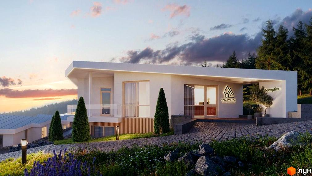 Котеджне містечко YAKO Villas: будівля з великими вікнами, терасою та бруківкою на подвір'ї.