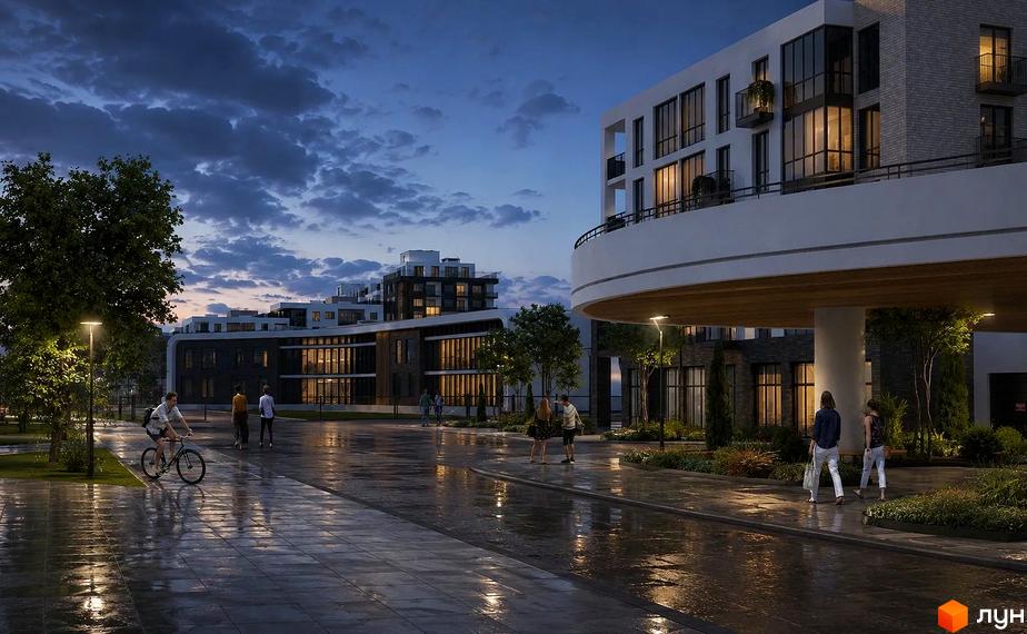 Архітектура ЖК River Park вечірньої пори з підсвічуванням і благоустроєною прибудинковою територією.