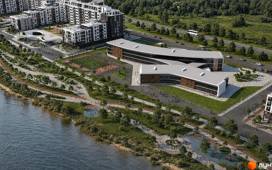 Архітектура будівель ЖК River Park із панорамними вікнами, оточена парковою зоною та спортивними майданчиками біля річки.