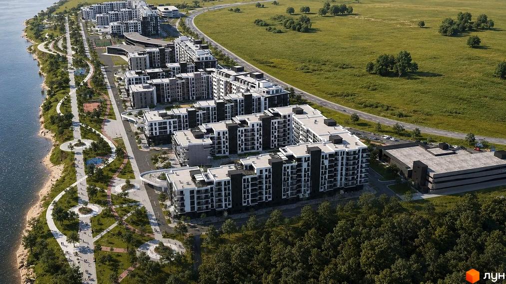 ЖК River Park з біло-чорними фасадами та облаштованою прибудинковою територією біля річки.