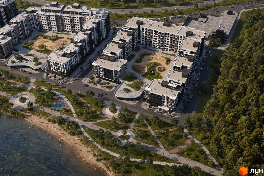 Звіт з висоти на біло-сірі багатоповерхові будинки ЖК River Park та облаштований внутрішній двір з дитячим майданчиком.