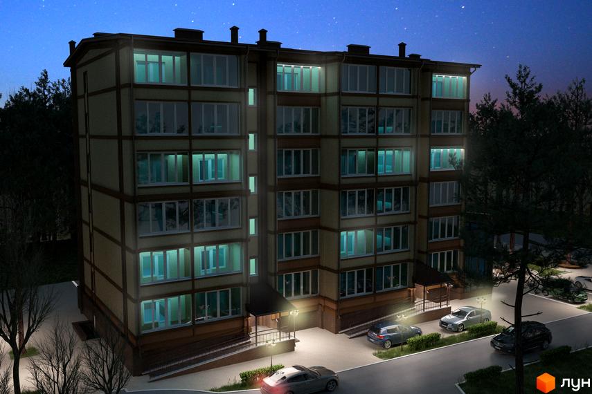 Зображення фасаду Житлового комплексу Яснополянський вночі. Багатоповерховий будинок з великими вікнами та освітленою прибудинковою територією.