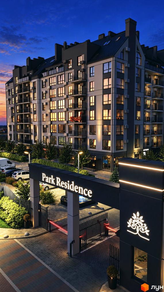 Житловий комплекс Park Residence з підсвіченими вікнами на фасаді та в'їздною групою з вивіскою.
