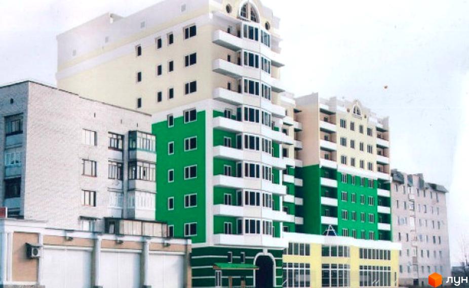 Зовнішній вигляд житлового комплексу на вул. Героїв Маріуполя (Чехова) з багатоповерховими будинками зеленого та кремового кольорів. На зображенні також видно сіру будівлю та елементи прибудинкової території.