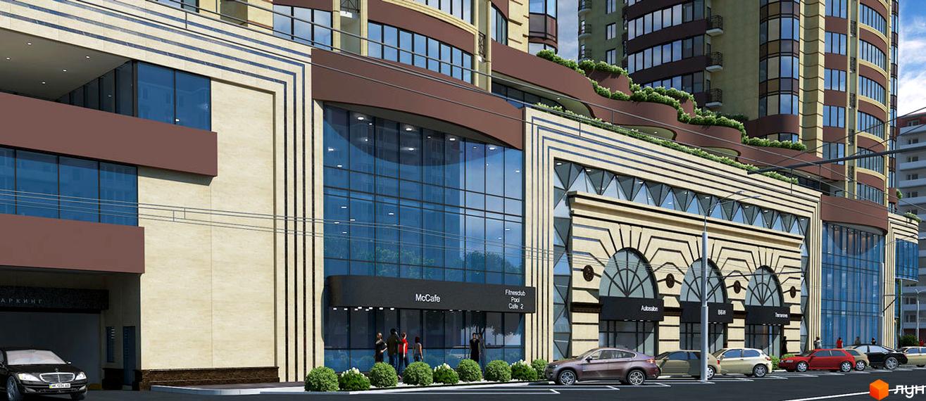 Житловий комплекс Grand Palace з фасадом з мармурових плит та великими панорамними вікнами. На першому поверсі розташовані комерційні приміщення та вхід до паркінгу.