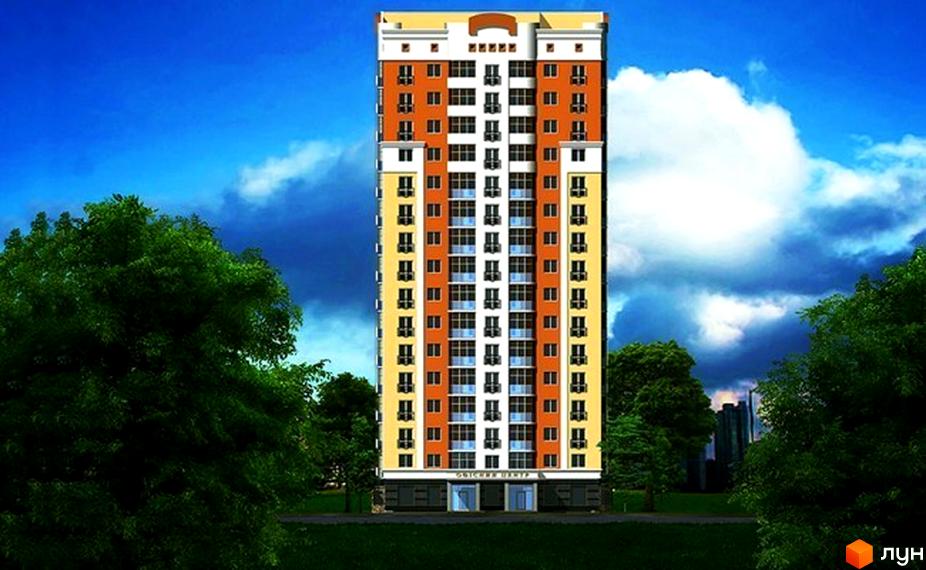 Багатоповерховий будинок ЖД Турбинка з помаранчево-жовтим фасадом та численними вікнами на тлі блакитного неба. Навколо будинку зелені дерева та трава.