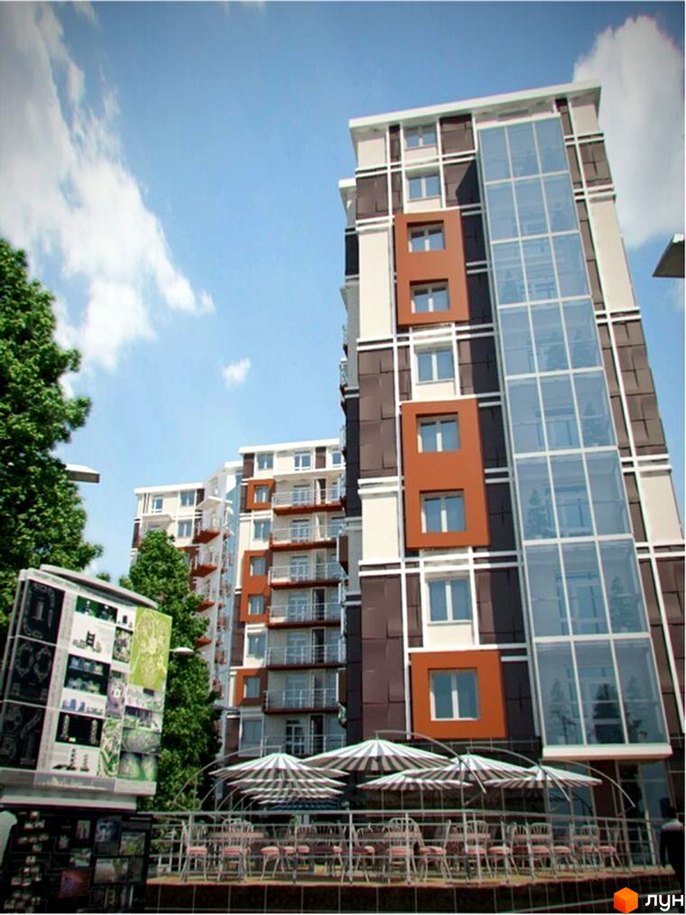 Багатоповерховий житловий комплекс на вул. Канівська, 18, з коричневими та світлими фасадами, скляними вставками. Поруч літній майданчик з парасольками.