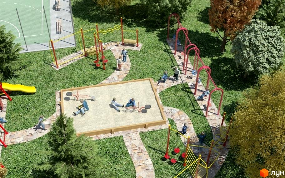 Зображення дитячого майданчика в Житловому комплексі Набережний квартал. На території пісочниця, гойдалки та спортивні тренажери.