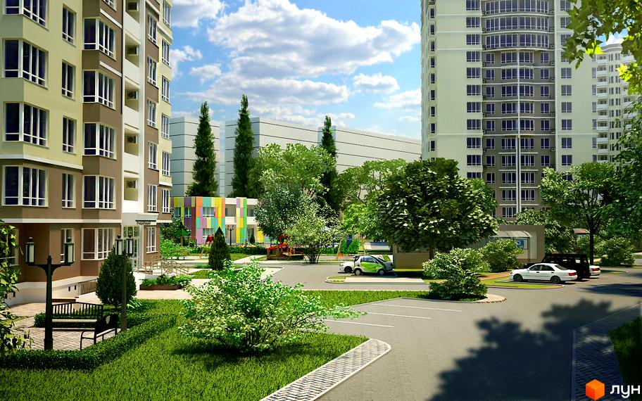 Зовнішній вигляд новобудови ЖК SunCity з різнокольоровим фасадом та прибудинковою територією з деревами та дитячим майданчиком. Парковка з автомобілями.