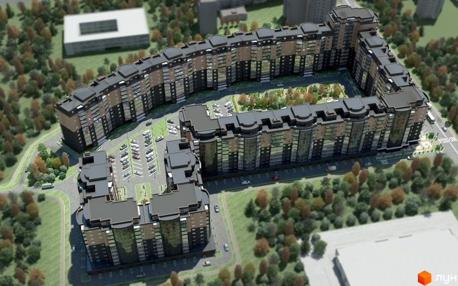 Зображення Житлового комплексу Набережний квартал з висоти пташиного польоту. Вигляд на будівлю та внутрішній двір з озелененням і парковкою.