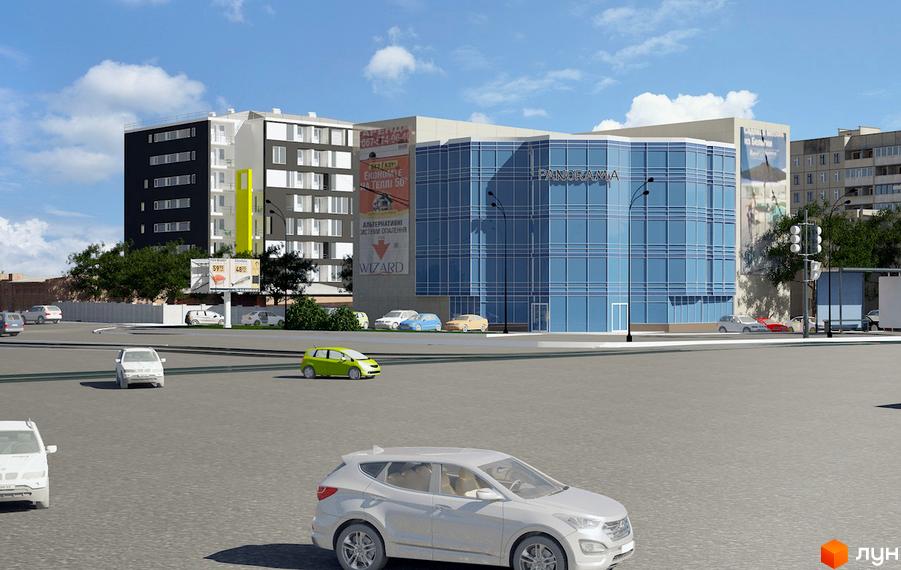 Зовнішній вигляд житлового комплексу Berlin House з блакитним скляним фасадом і чорно-білою частиною. Навколо розташовані дороги та автомобілі.