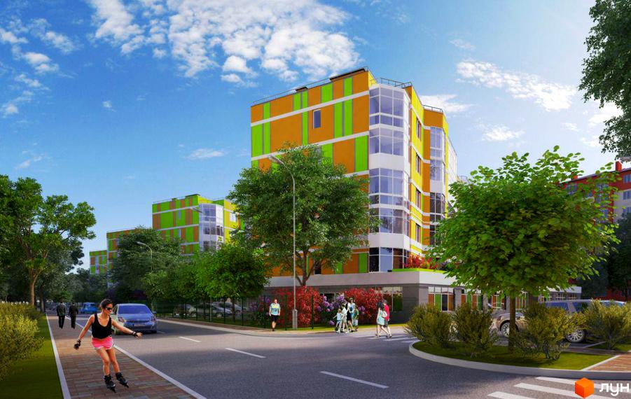 Житловий комплекс Позитив з яскравим фасадом та скляними балконами. На прибудинковій території облаштовані доріжки для ролерів та зелені насадження.