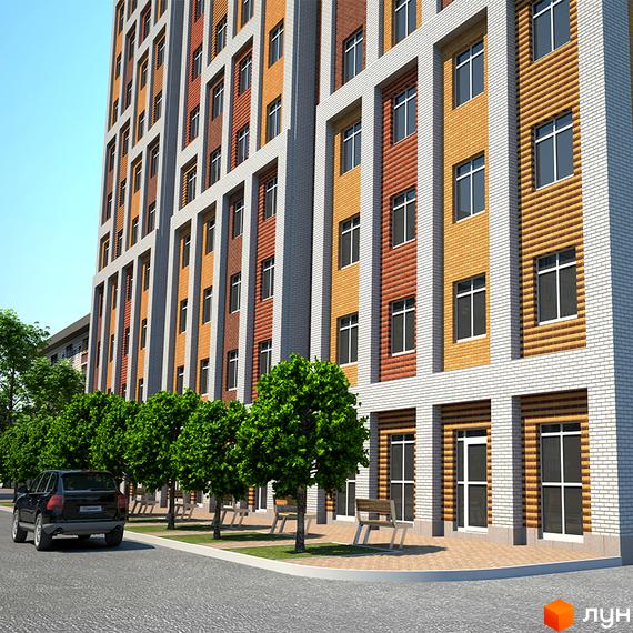 Новобудова ЖК Добробут з фасадом з цегли різних кольорів та вікнами. Поруч зелені дерева та лавки для відпочинку.
