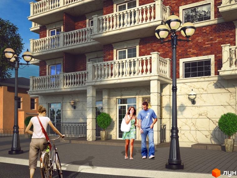 Фасад житлового комплексу Британський дім з балконами та цегляною кладкою. На прибудинковій території видно людей, що прогулюються.