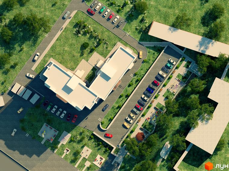 Житловий комплекс Затишний: вид зверху на білий L-подібний будинок, парковки з автомобілями, зелені насадження та дитячі майданчики.