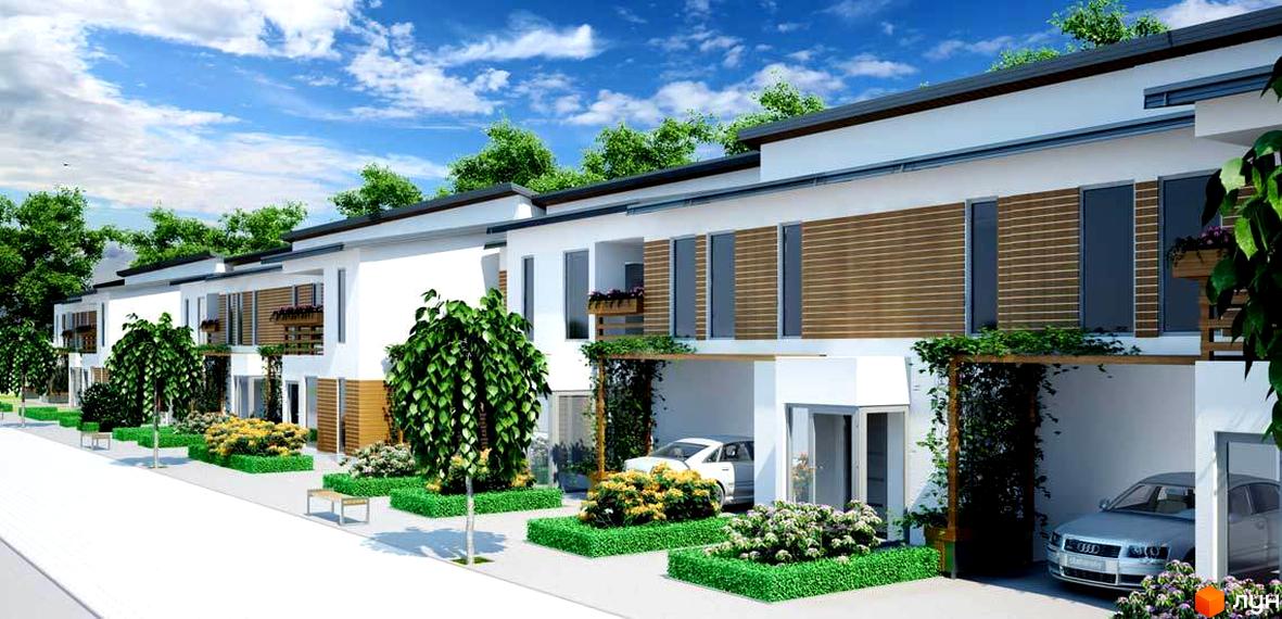 Таунхауси Південний квартал з білими фасадами та дерев'яними елементами. Прибудинкова територія з доглянутими газонами, кущами та деревами.