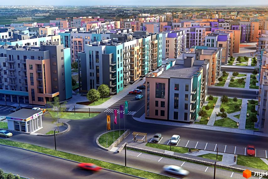 Зовнішній вигляд житлового комплексу Європейка з різнокольоровими фасадами будинків та доглянутою прибудинковою територією з парковками та зеленими зонами.