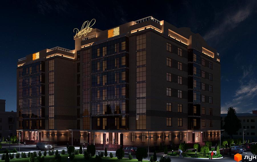 Житловий комплекс Palladio вночі. Зовнішній вигляд будівлі з підсвіченими вікнами та вивіскою. Прибудинкова територія з освітленням та деревами.