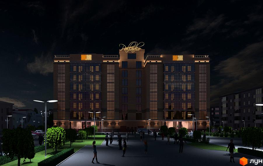 Житловий комплекс Palladio вночі. Багатоповерховий будинок з підсвіченими вікнами та вивіскою 