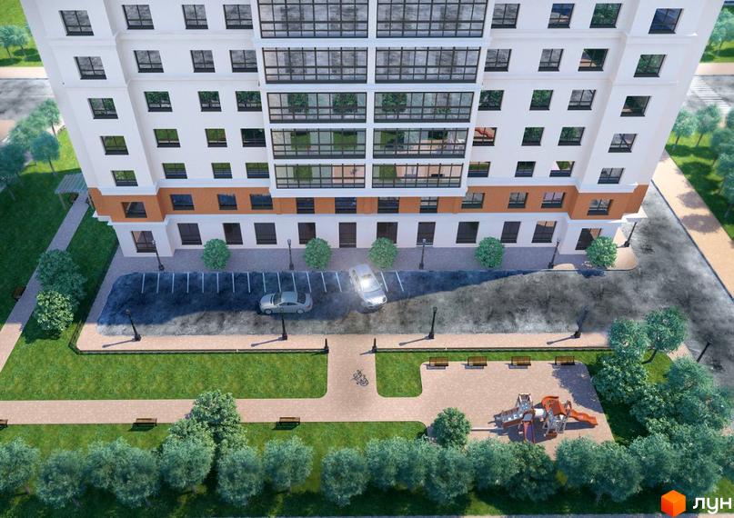 Зображення фасаду та прибудинкової території Житлового комплексу Проскурів. Вигляд зверху на будинок, парковку та дитячий майданчик.