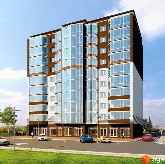 Житловий комплекс Аристократ - багатоповерхова новобудова з панорамним склінням та коричневими фасадами. Перед будинком розташована парковка з автомобілями та зелена зона.