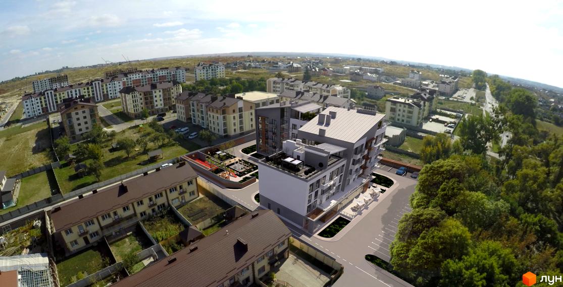 Житловий комплекс Luxury Square з багатоповерховими будинками та прибудинковою територією з дитячим майданчиком. Зовнішній вигляд новобудови та її оточення.