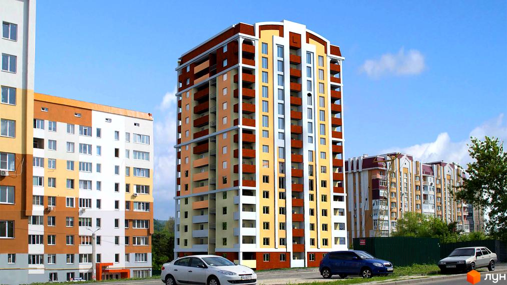 Житловий комплекс Балакірєва - багатоповерхові будинки з балконами та вікнами, розташовані вздовж дороги з автомобілями.