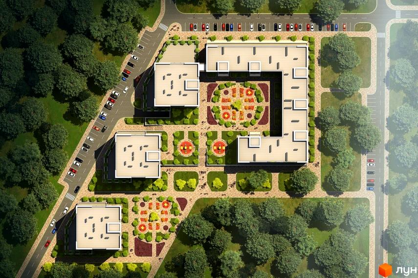 Вид зверху на житловий комплекс Chehov Парк Квартал з декількома корпусами, внутрішніми дворами та дитячими майданчиками. Навколо комплексу зелені насадження та паркувальні місця.