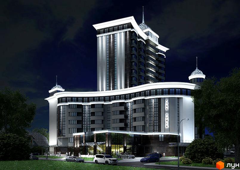 Новобудова Park Tower вночі з підсвіткою фасаду та прибудинковою територією з деревами та автомобілями. Комплекс має багатоповерхову вежу та нижню частину з вигнутими лініями.