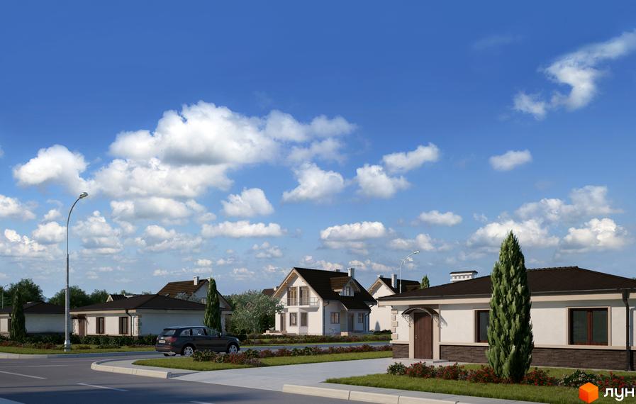 Будинки котеджного містечка Хуторок зі світлими фасадами та темними дахами, оточені доглянутими газонами та зеленими насадженнями вздовж дороги.