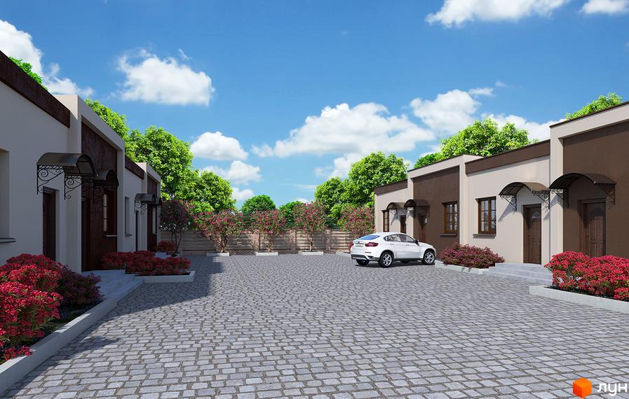 Котеджне містечко Хуторок. Одноповерхові будинки з фасадами світлого та темно-коричневого кольору, бруківка у дворі, червоні квітучі кущі та зелені дерева.