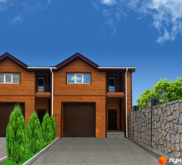 Житловий комплекс з дерев'яним фасадом та гаражами. Бруківка та зелені насадження перед будинками, кам'яний паркан збоку.