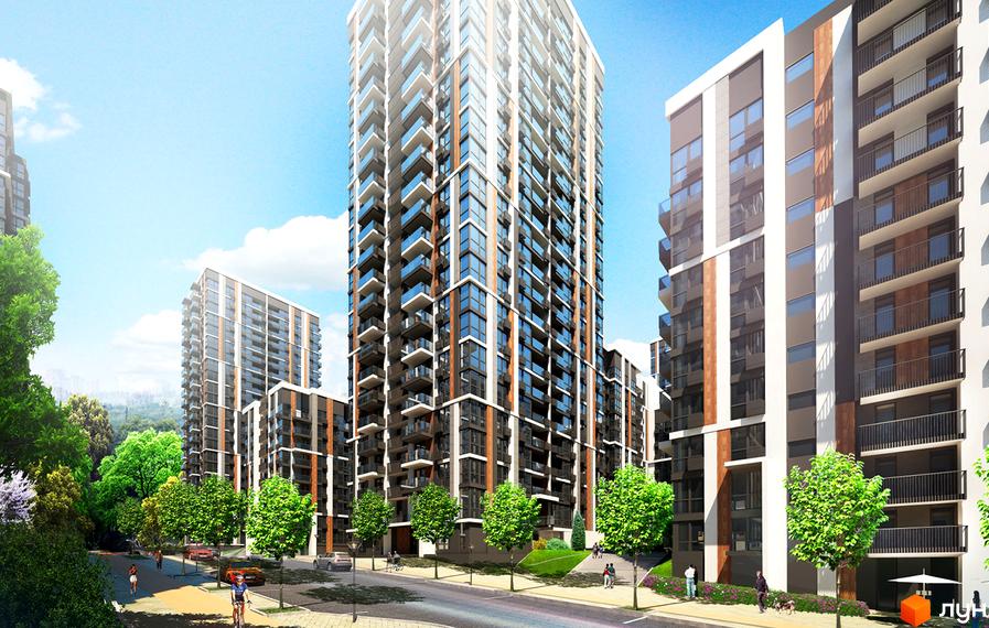 Зовнішній вигляд багатоповерхових будинків ЖК Французький квартал 2 з балконами та скляними фасадами. Навколо комплексу зелені дерева та доглянута прибудинкова територія.