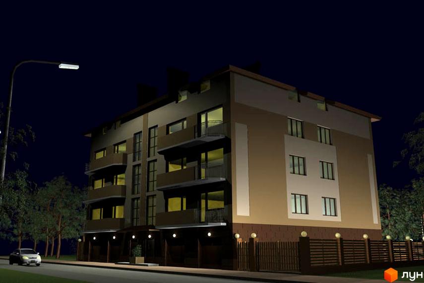 Багатоповерхова новобудова на вул. Ударна, 26а вночі, з освітленими вікнами, балконами та прибудинковою територією з огорожею і ліхтарями.