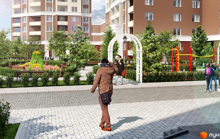 Житловий комплекс Palladium: фасади будинків та зелена прибудинкова територія з дитячим майданчиком та зонами відпочинку.