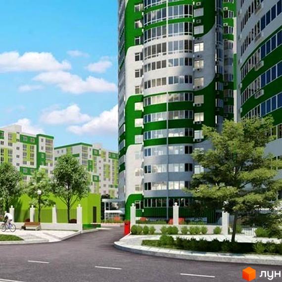 Житловий комплекс ЖМ Острови з яскравим фасадом та зеленими елементами. Прибудинкова територія з деревами та велосипедною доріжкою.