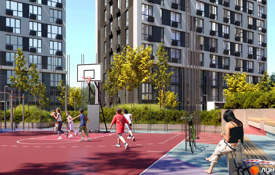 Житловий комплекс Славутич 2.0: діти грають у баскетбол на спортивному майданчику біля висотних будинків. На лавці сидить дівчина.