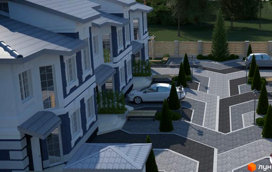 Котеджне містечко Чарівні Стежки. Будинки з білими стінами, синіми вікнами та сірими дахами. Територія з бруківкою, лавками та озелененням.