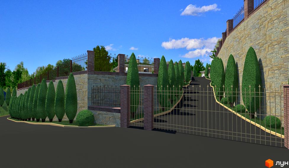 Котеджне містечко Ярий Смарагд: кам'яна стіна з кованими огорожами та акуратно підстриженими туями вздовж дороги. Зелені насадження та паркан оточують територію комплексу.