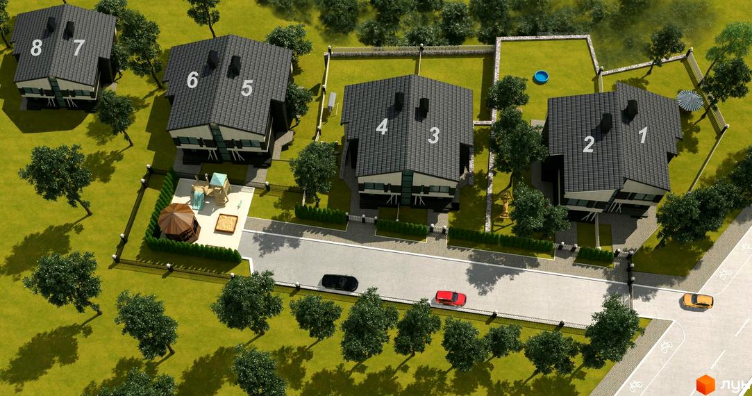 Вигляд зверху на Котеджне містечко Люксус Дім. Двоповерхові будинки з сірими дахами та зеленими подвір'ями, дитячий майданчик та дорога.