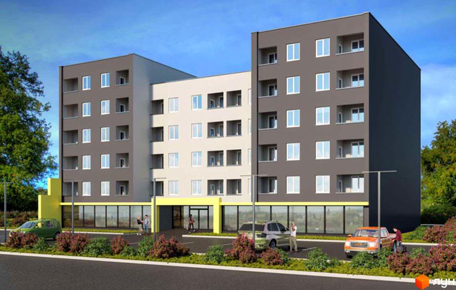 Зображення житлового комплексу з темним фасадом, великими вікнами та балконами. Перед будинком розташована парковка з автомобілями та зелені насадження.