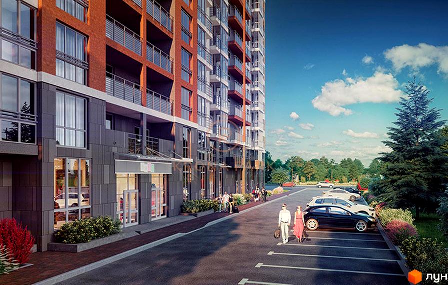 Житловий комплекс Krona Park з фасадом з цегли та темних панелей. На передньому плані парковка, пішохідна зона з людьми та зелені насадження.