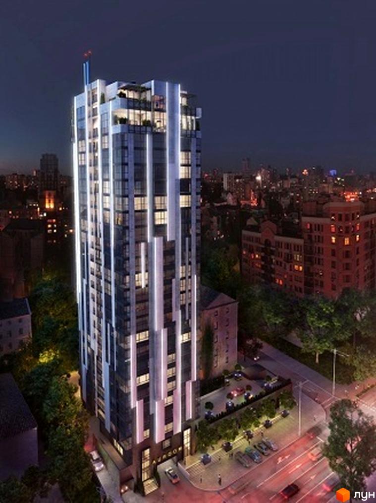 Висотна новобудова ЖК AuRoom з панорамними вікнами та підсвіткою у темну пору доби. На території комплексу розташована парковка для автомобілів.