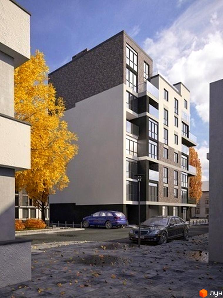 Житловий комплекс Park Hall Apartments. Багатоповерхова будівля зі світлим фасадом, цегляними вставками та великими вікнами. Навколо бруківка з опалим листям.