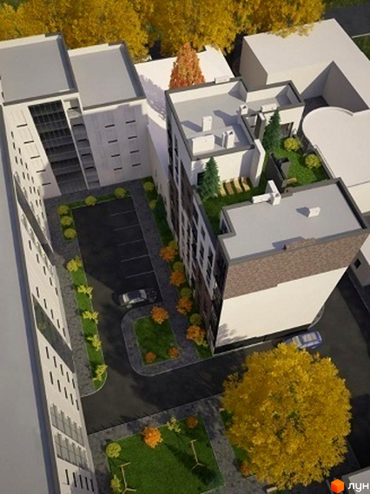 Зовнішній вигляд житлового комплексу Park Hall Apartments з елементами білого та цегляного оздоблення. На території є паркінг та зелені насадження.