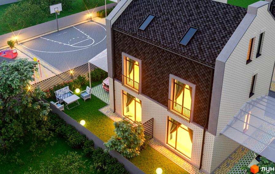 Двоповерховий будинок з темною покрівлею та великими вікнами. На прибудинковій території є газон, зона відпочинку та баскетбольний майданчик.