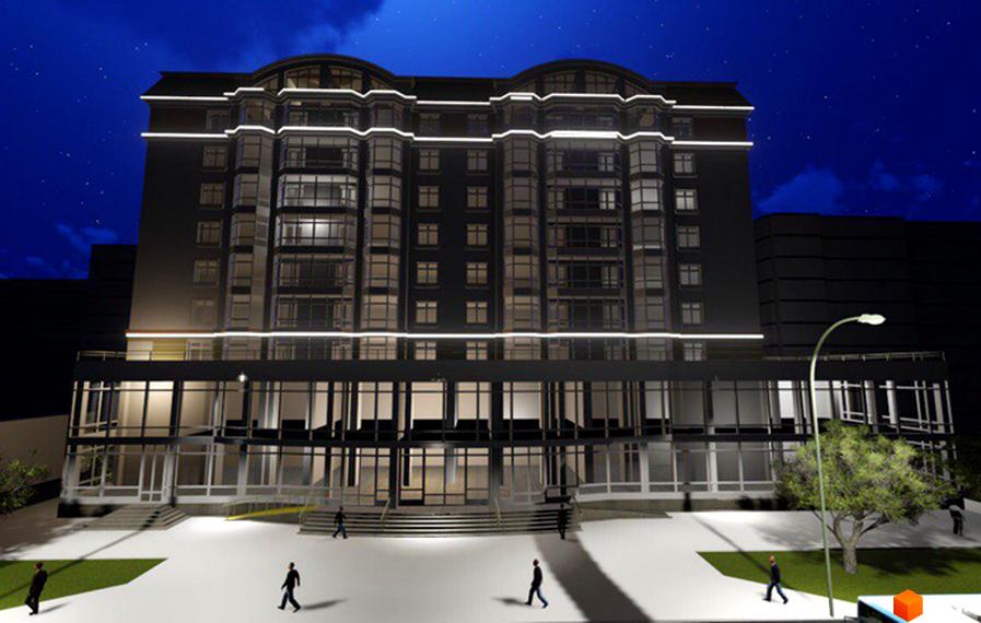 Новобудова ЖК Еталон з панорамними вікнами та підсвіткою фасаду вночі. Навколо будинку облаштована прибудинкова територія з деревами та пішохідними доріжками.