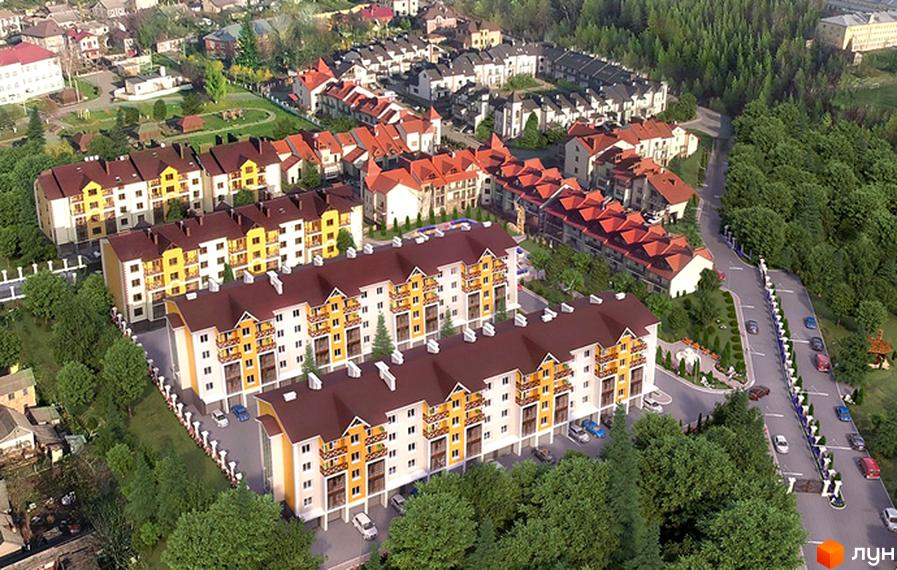 Зовнішній вигляд житлового комплексу Віденська брама з жовтими фасадами та коричневими дахами. Навколо комплексу зелені дерева та доглянута територія.